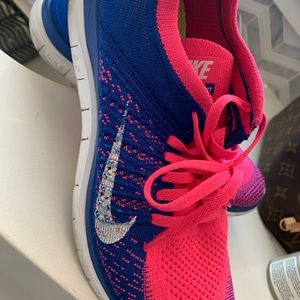 Nike tennis shoes pink and blue